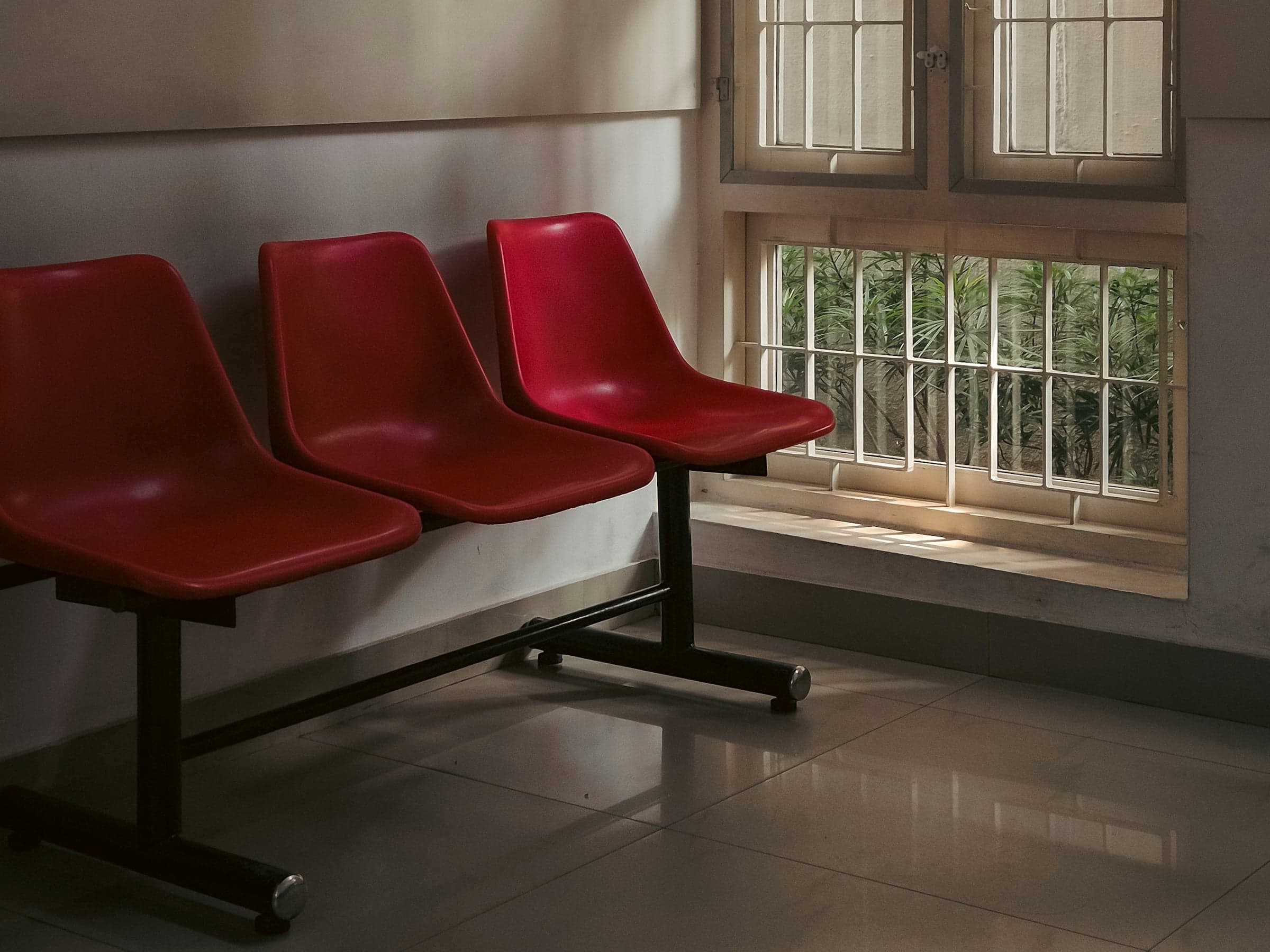 Waiting room chairs by a window